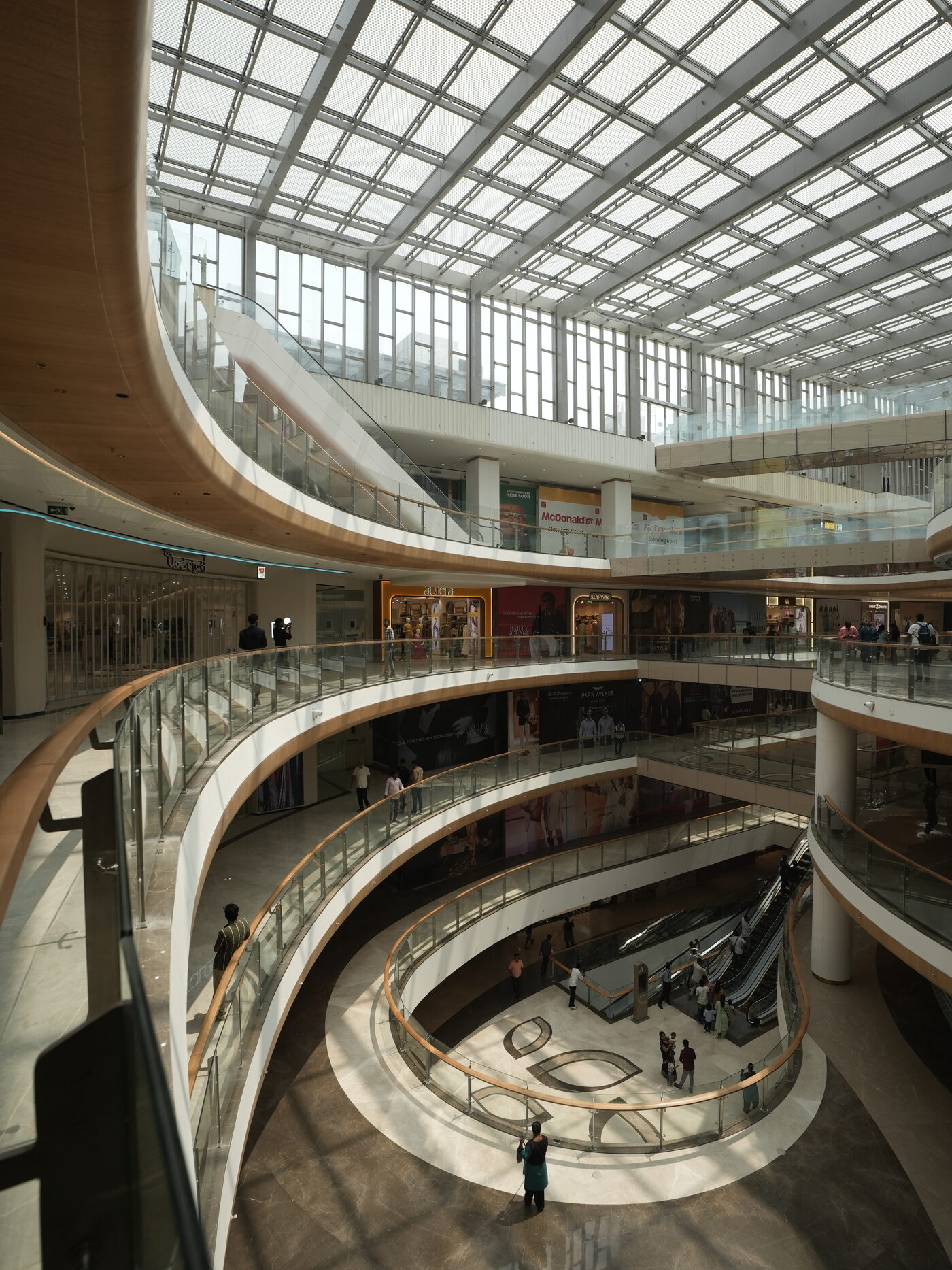 Curved balustrades around the void